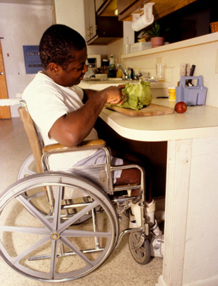 Knee space under cabinets accommodate wheelchairs