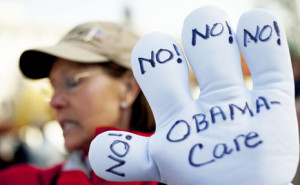 Obamacare Protest Sign shows Universal Healthcare Opposition